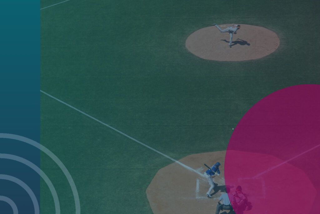 An aerial shot of a baseball diamond with players on it.